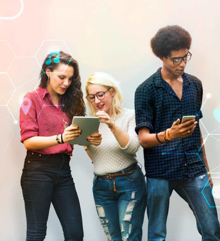Three people looking at their phones